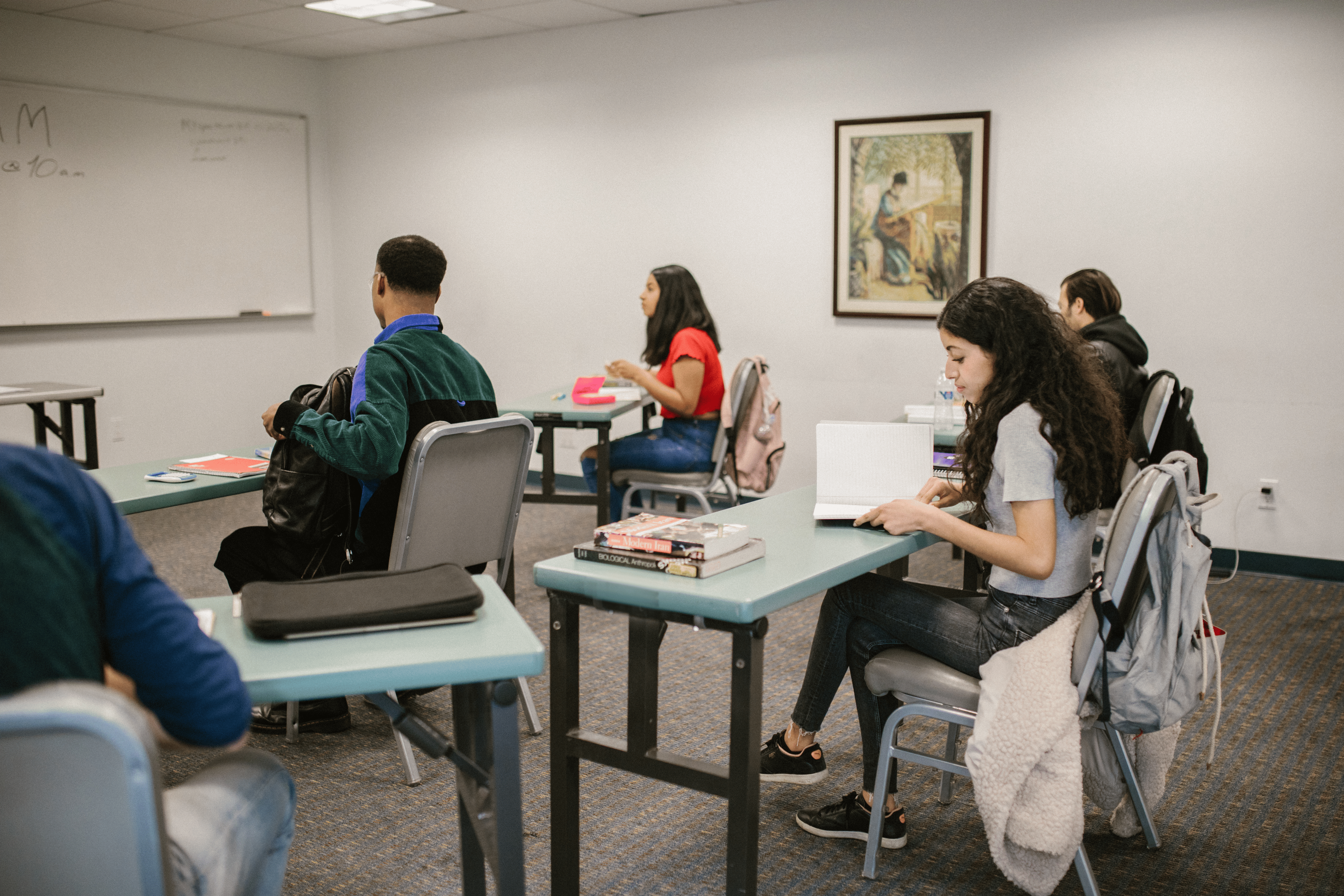 student inside the classroom attending in-person classes