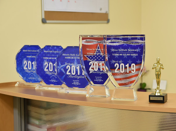 Shine in math academy trophies for Best of Burlington