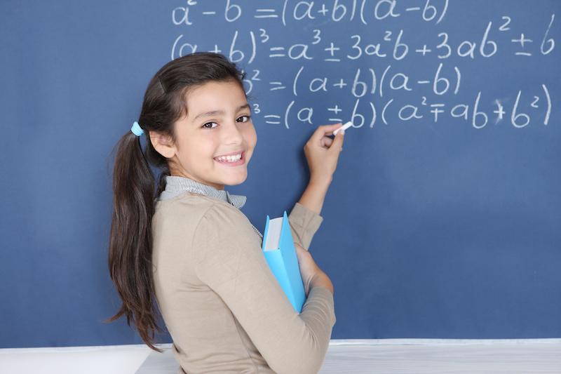 a girl solving an algebra problem