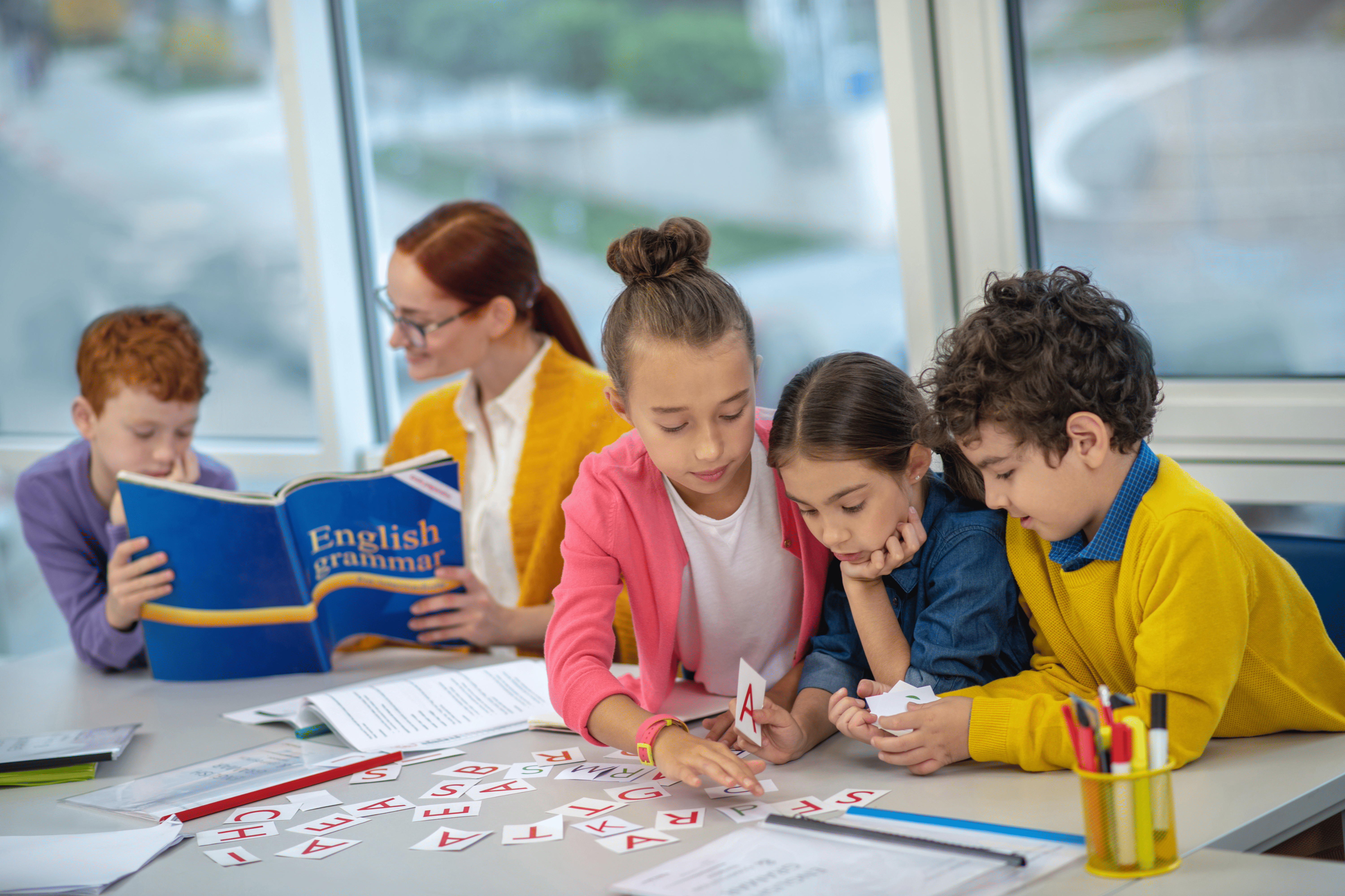 Children learning English grammar